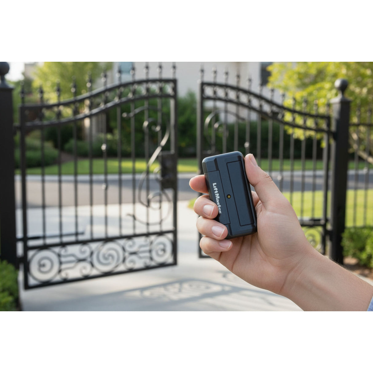 Liftmaster 811lmx Remote Control, Shown opening a gate | Elitegates.net